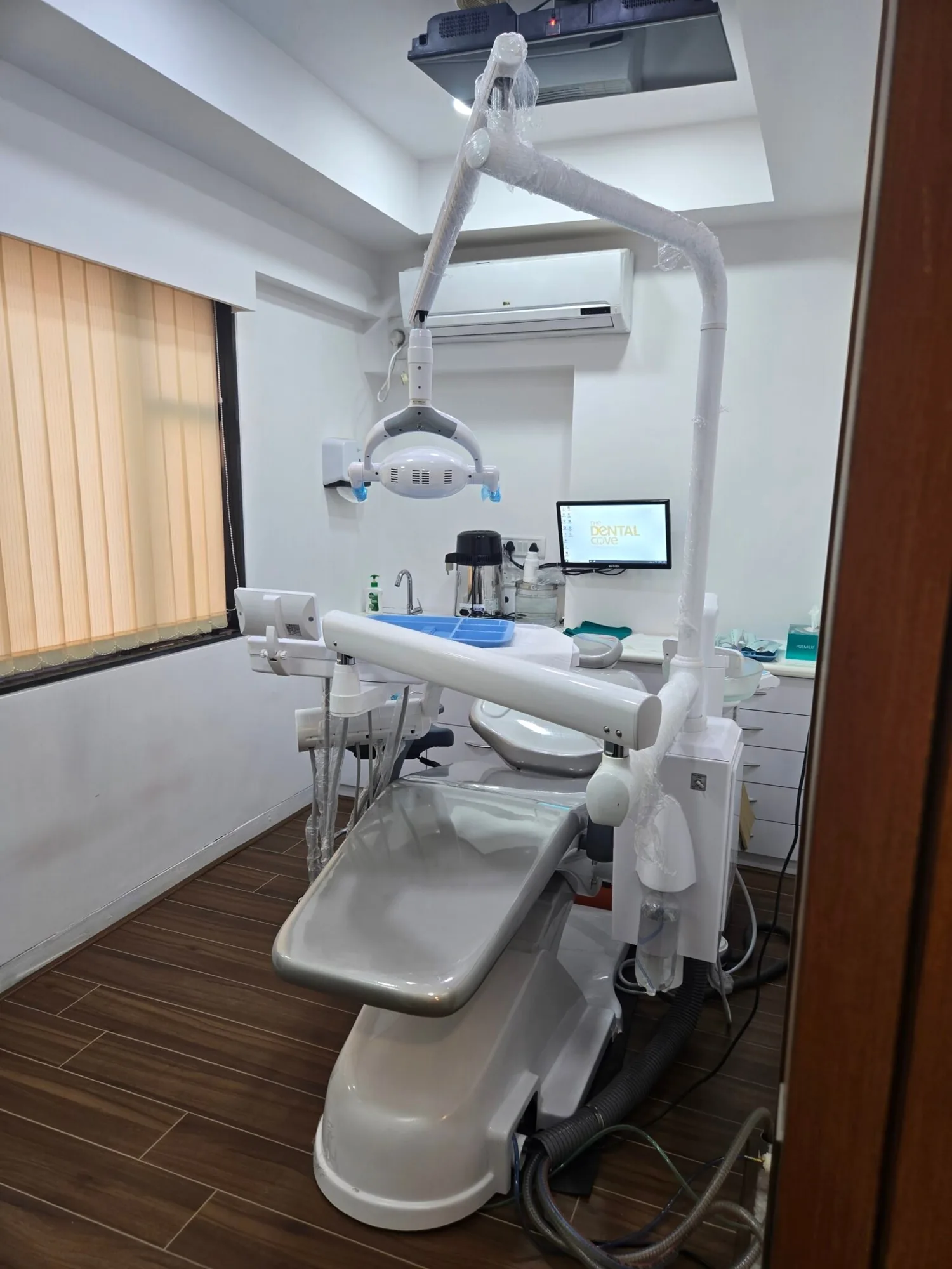Treatment room at The Dental Cove with modern dental equipment